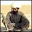Baloch man displays weapons